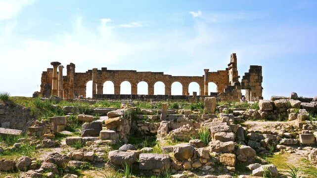 ancient roman basilica ruins with stone arches in volubilis morocco