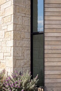 Random Ashlar Limestone Wall Meeting Weathered Cedar Siding Detail