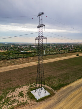 Aerial view of power lines over farmland in Fejer County, Hungary area