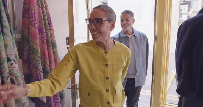 Senior Couple Shopping for Stylish Outerwear Together