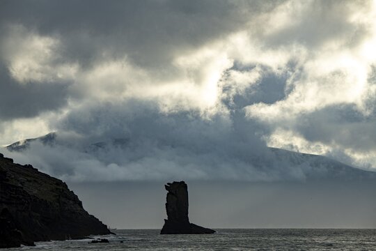 North Atlantic with rock needle and cloudy sky, Dingle Peninsula, Kerry, Ireland