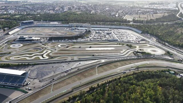 Aerial drone view of the Hockenheimring Baden-Wurttemberg in Germany, showing the famous motor racing circuit, grandstands, track layout and motorsport infrastructure.