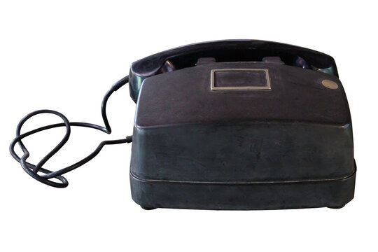 An old telephone without a dial is dirty and scratched