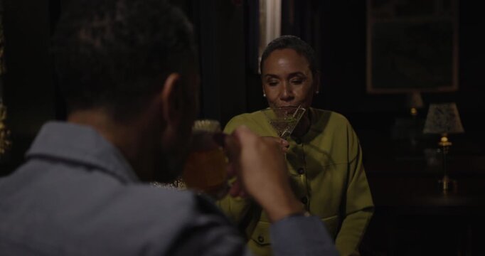 Senior Couple Enjoying a Drink at a Luxury Cocktail Lounge