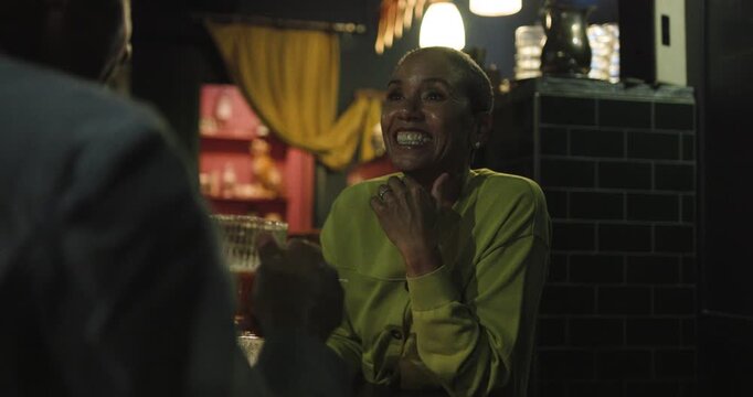 Senior Couple Enjoying a Drink at a Luxury Cocktail Lounge