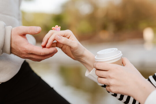 woman and man holding hands. Shallow dof.