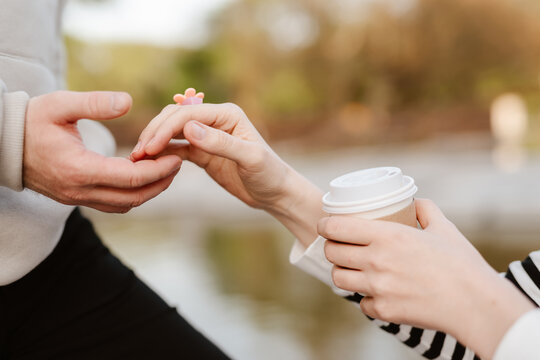 woman and man holding hands. Shallow dof.