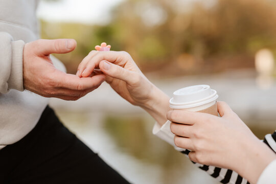 woman and man holding hands. Shallow dof.