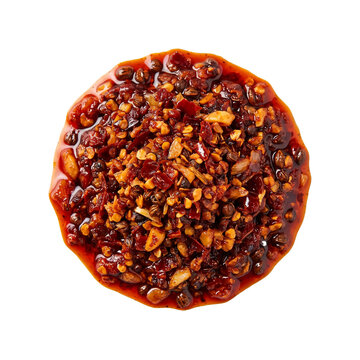 Spicy chili oil crisp condiment with crunchy garlic flakes and Sichuan peppercorns on transparent background