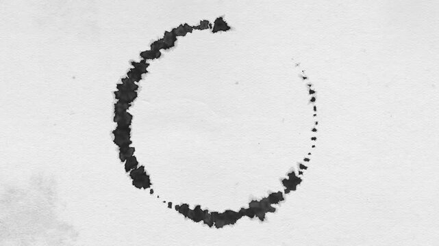 Ink Drop Circle On Grain Textured Paper Background
Animation of a black ink circle growing on paper with copyspace for your message or logo to put inside