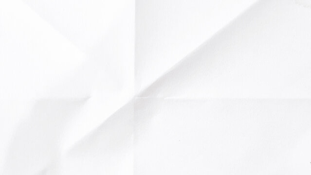 Minimal White Paper Background With Broad Diagonal Fold And Soft Surface Shadows