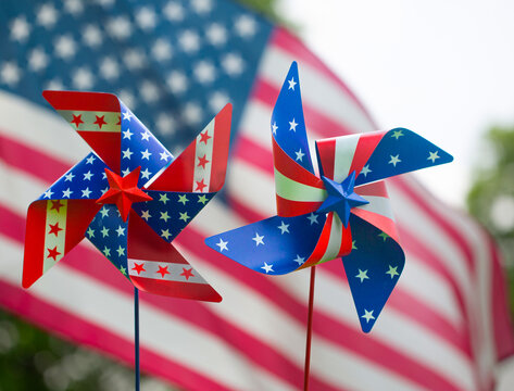 Colorful Fourth Of July pinwheels and Flag