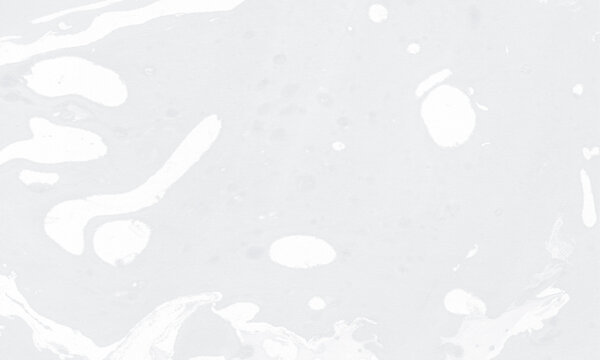Light grey marble texture displaying smooth liquid patterns in a minimalist style.