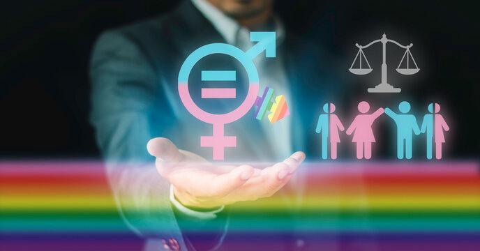 Businessman holding gender equality and LGBT pride concept. Diversity equity and inclusion DEI, justice scale law, human rights, corporate governance, and social balance.