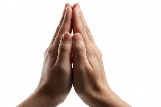 Close up of human hands in prayer gesture isolated on white. Person makes namaste pose apologizes with palms together. Symbol of faith, spirituality, gratitude, peace for religious meditation