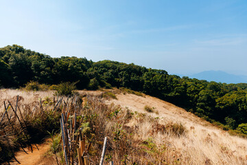 Obraz premium Dry hillside trail View point of National Park Doi Inthanon Chiang Mai, top highest mountain of Thailand.