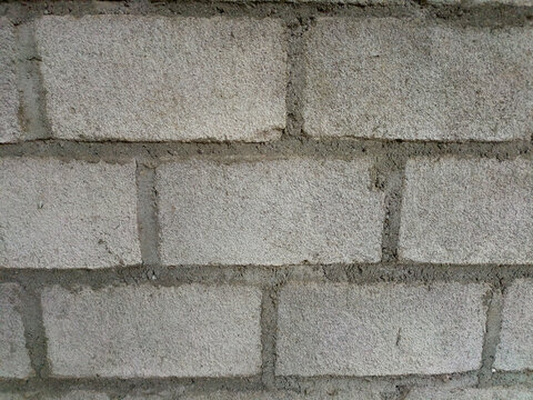 Close up view of grey concrete block wall texture background