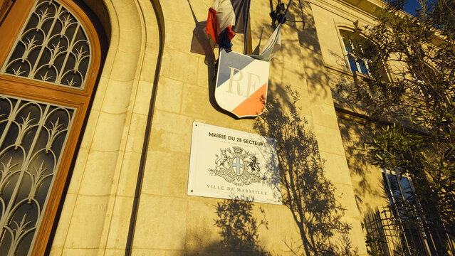 MARSEILLE, FRANCE - SEPTEMBER 16, 2026 - Marseille City Hall exterior showing the Mairie du 2e Secteur sign and French flag
