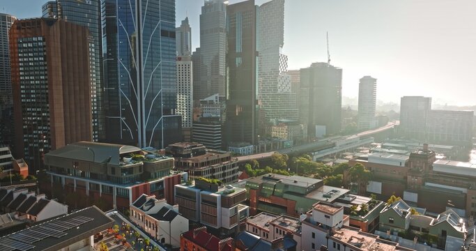 Aerial view of the Sydney central business district skyline with modern skyscrapers, historic rooftops, and urban architecture in Sydney, New South Wales, Australia.