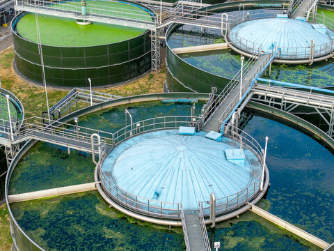 Aerial view of circular settling tanks in wastewater treatment plant