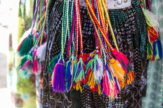 Pompoms worn by Oromo single girl, Sambate, Ethiopia