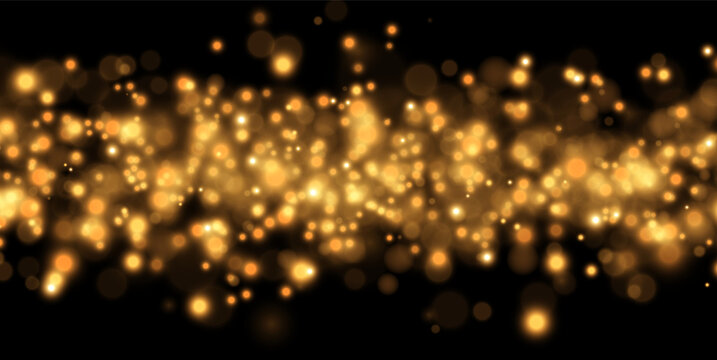 A cascade of glowing golden bokeh lights creates a radiant scattered effect across a dark backdrop. The orbs vary in size and intensity with soft edges and warm hues.
