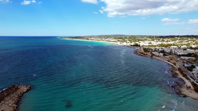 Marina di Pescoluse, Puglia &ndash; Torre Vado &ndash; opening aerial shot overlooking the stunning coastline
