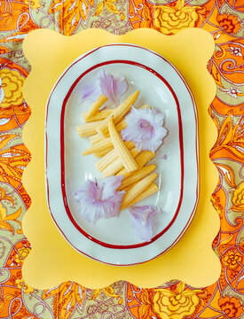Colorful plate with food in a decorative setting