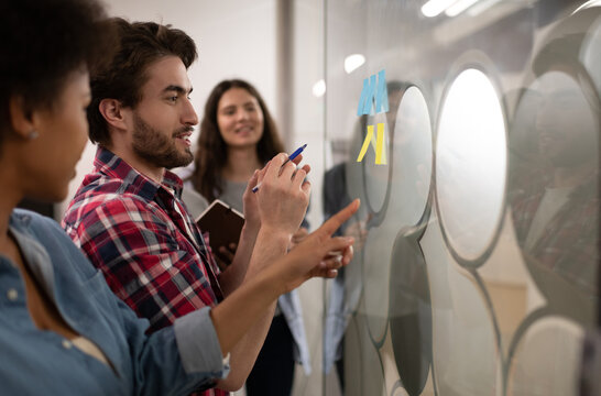 Diverse colleagues brainstorming in office