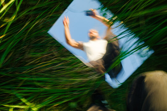 Man Jumps Over Mirror While Taking A Selfie