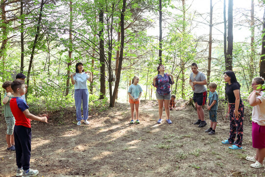 Children with Down syndrome are vacationing at a camp.