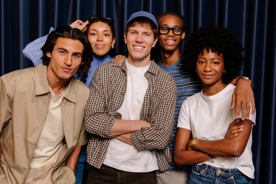 Studio portrait of a diverse creative team posing cheerfully.