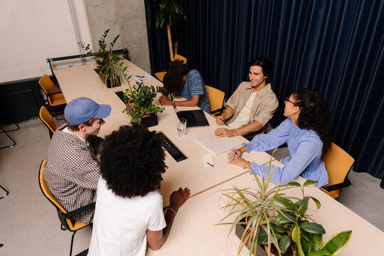 General shot of young people working together and connecting