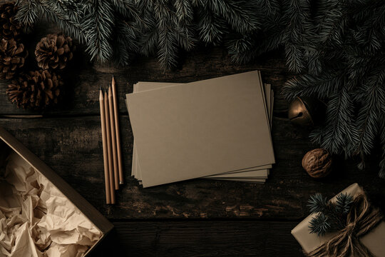 Blank craft card on wooden background