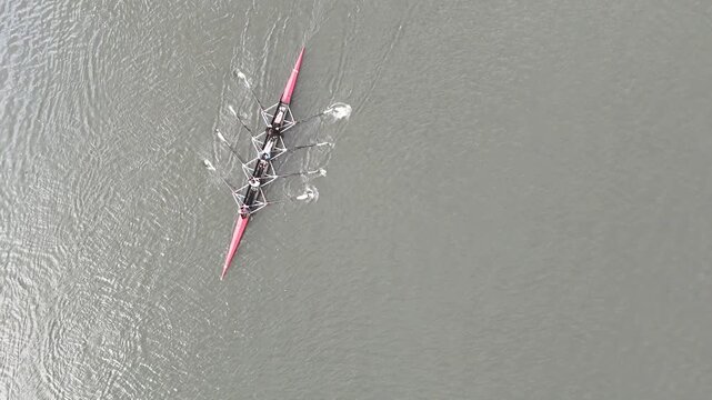 Aerial Top-Down View of Rowers in a Racing Shell on the Water
