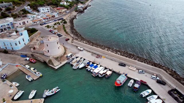 Marina di Pescoluse, Puglia &ndash; Torre Vado &ndash; rotating, downward-facing aerial shot of the harbor wall
