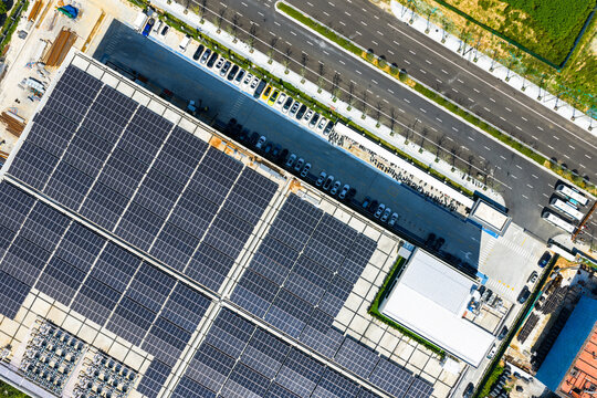 solar panels covering factory rooftop