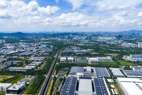 modern industrial park with city skyline beyond