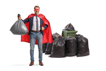 Superhero businessman cleaning and collecting waste © Ljupco Smokovski