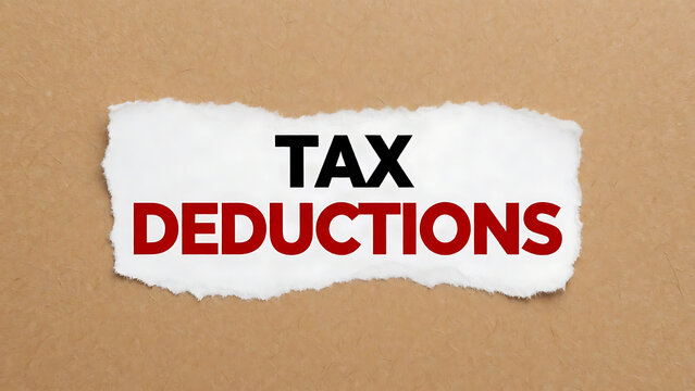 Tattered paper note with tax deductions text on brown cardboard background