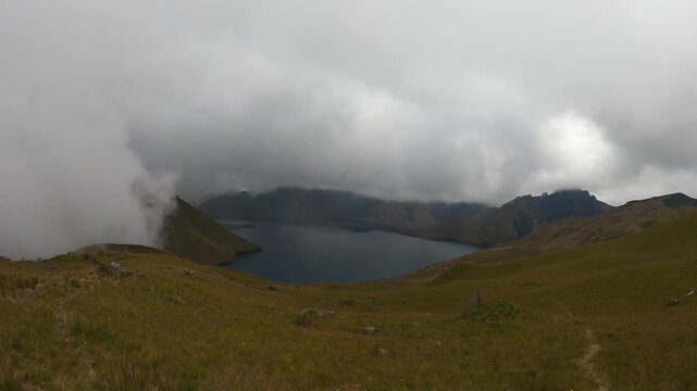 Timelapse og Mojanda logoon in Ecuador with fog between the mountains