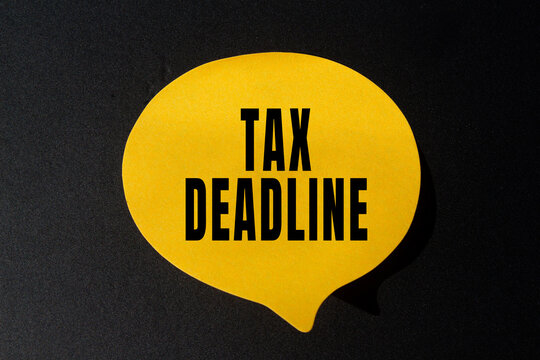 Tax deadline text concept photo