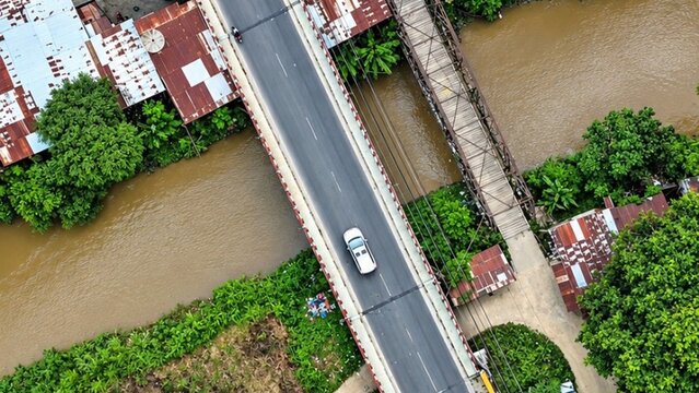 Aerial View of Gedong Krung Passe Bridge Over a River in Aceh, Indonesia