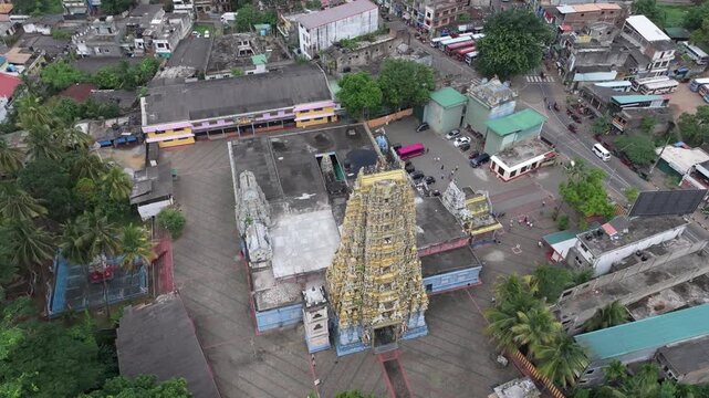 Aerial view of the ornate Sri Muthumariamman Temple with its colorful gopuram and courtyard in Kandy, Central Province, Sri Lanka.