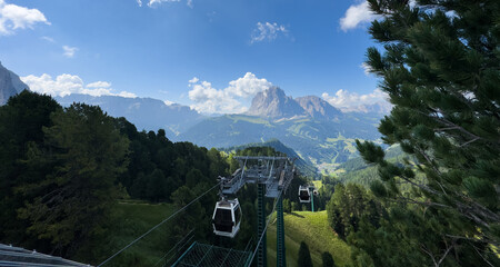 Aerial view from cable car gondola over Alpine valley and pine forest, Seceda, Val Gardena, Dolomites, Italy Stock Photo © Angelov
