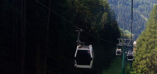 Aerial view from cable car gondola over Alpine valley and pine forest, Seceda, Val Gardena, Dolomites, Italy Stock Photo © Angelov
