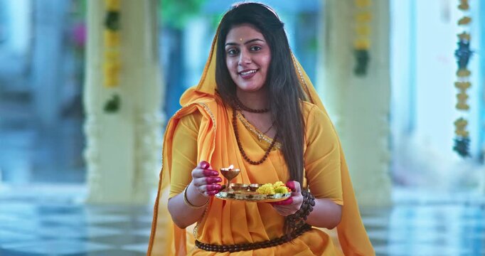 Indian Saint Mirabai Performing Aarti and Offering Prayers to Lord Krishna. Traditional Rajasthani devotional worship, Hindu temple rituals, and spiritual bhakti
