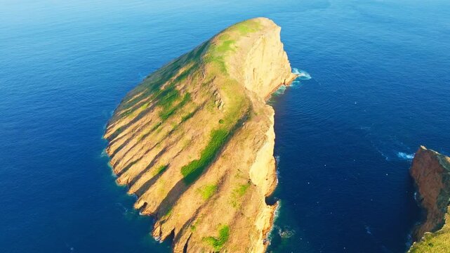Ilheu Grande. Cabras Islets and Atlantic Ocean at Sunset. Terceira Island, Azores, Portugal. Aerial View. Moving Forward, Tilt Down