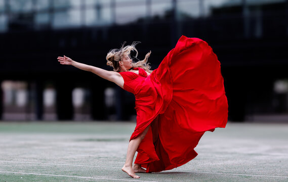 Dancer in Flowing Red Dress