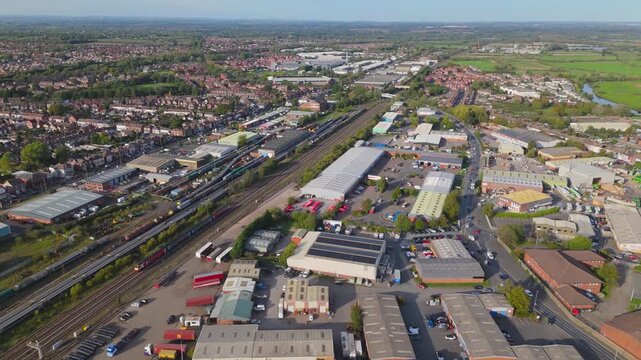 Panoramic aerial view of railway line running through town landscape
